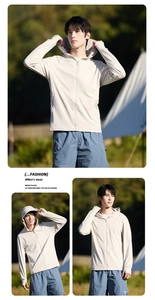 Detail view of breathable sun protection jacket with hood and thumbholes for outdoor activities