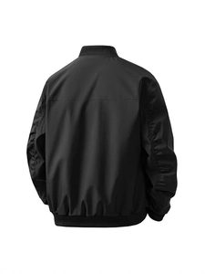 Back view of black slim-fit bomber jacket with ribbed collar and polyester matte finish