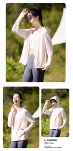 Detail view of pink sun protection jacket with thumb holes and hood for outdoor activities