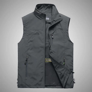 Detail showing the breathable mesh lining and zippered pockets of the charcoal outdoor vest