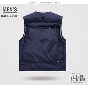 Detail view of breathable black mesh back and functional zipper pockets on navy outdoor vest