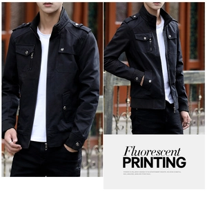 Detail of black military cargo jacket with epaulets, multi-pockets and ribbed cuffs