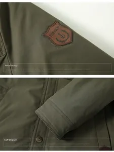 Detailed close-up of military green jacket sleeve with brown leather fashion anchor patch