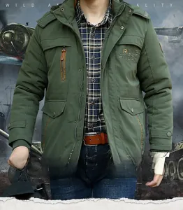 Detail of army green padded workwear jacket with hooded collar and rough stock embroidery
