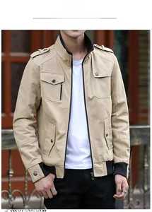 Detail of khaki military style work jacket with ribbed collar and shoulder epaulettes