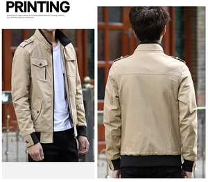 Detail view of khaki military cargo jacket with stand collar and functional utility pockets