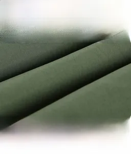 Detail of army green twill fabric showing windproof and wear-resistant texture