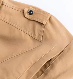 Close-up of shoulder epaulet and stitching on khaki cotton military deck jacket