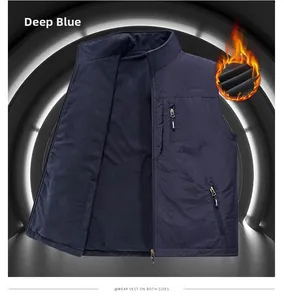 Detail view of dark blue fleece vest with stand collar, double-sided wear, and zip pockets