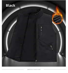 Detail of black double-sided fleece vest showing thermal stand collar and zippered chest pocket