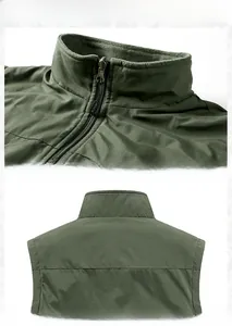 Detail of stand-up collar and warm fleece lining on dark green outdoor vest