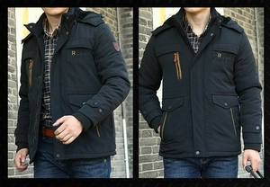 Detail of black winter work parka with plush fur collar and ROUGH STOCK embroidery