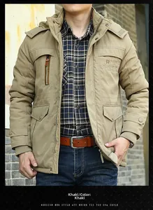 Detail of khaki men's winter jacket showing hooded collar and embroidered pocket details