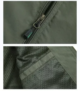Detail of army green vest with durable metal sports zipper and breathable mesh lining