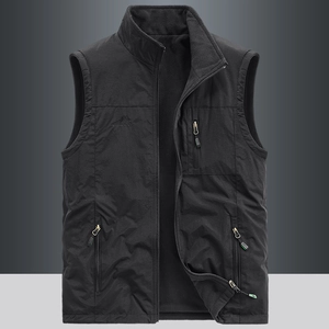 Men's black fleece outdoor vest with stand collar, three zipper pockets, and warm lining