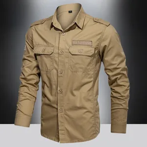 Detail of khaki men's long sleeve shirt with dual chest pockets and shoulder epaulettes