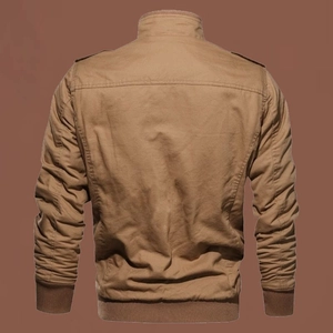 Rear view of khaki cotton work jacket featuring stand-up collar and ribbed cuffs