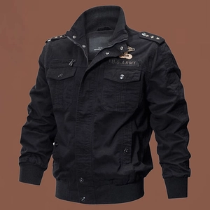 Detail of US Army embroidery and epaulettes on a black cotton military tactical jacket