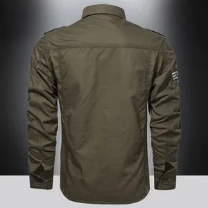 Detail view of military green cotton shirt back with inverted pleat and sleeve patch