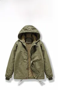 Detail view of military green hooded jacket featuring soft sherpa lining and drawstring hem