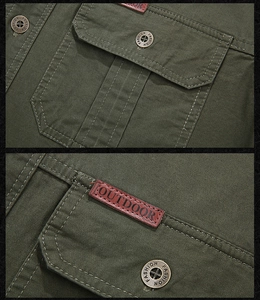 Detail of army green cargo shirt with outdoor leather patch and vintage metal buttons