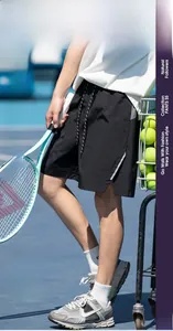 Waterproof technical cargo shorts featuring reflective strips and breathable fabric detail