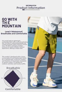 Detail of yellow tactical shorts showing waterproof fabric and breathable mesh structure