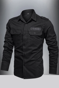Close-up of military style black shirt featuring chest pockets and fashion patches