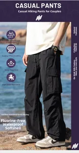 Detail view of black lightweight waterproof outdoor tech pants with side cargo pocket feature