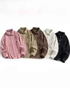 Detail of five corduroy long sleeve shirts showing striped texture and flap pockets
