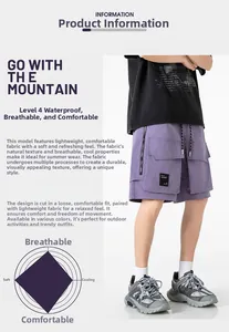 Détails du short cargo violet montrant le tissu imperméable et les performances techniques