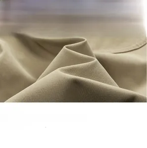 Detailed close-up of khaki twill cargo shorts showing rear pocket and fabric texture