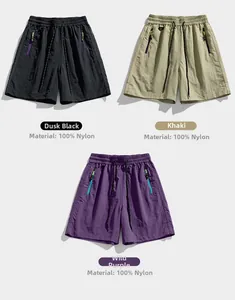 Three colors of men's nylon cargo shorts with zipper pockets in black, khaki, and purple