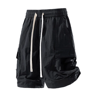 Water-repellent black cargo shorts with elastic drawstring waist and side utility pockets