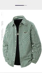 Detail of green and white zigzag textured denim shirt with a logo pocket on the front