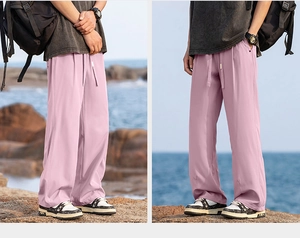 Detailed view of light purple quick-dry camping pants with elastic drawstring waist