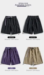 Nylon cargo shorts in black, purple, and khaki with elastic drawstring and buckle waist