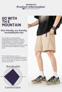 Detail view of khaki cargo shorts with elastic waistband and purple functional strap detail