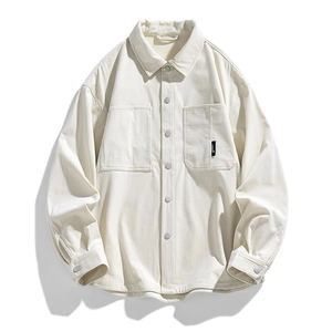 Men's cream corduroy shirt jacket with long sleeves and dual chest pockets