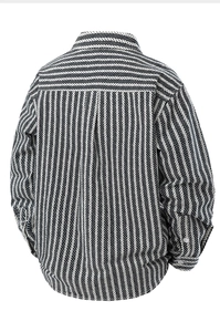 Detail view of the black and white jacquard pattern on the back of this denim shirt jacket