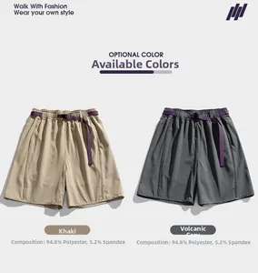 Detail view of khaki and grey casual shorts showing elastic waist and fabric composition