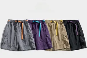 Detail of four quick-dry cargo shorts in grey, purple, khaki, and black with contrast belts
