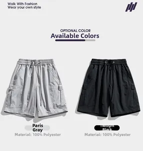 Detail view of elastic drawstring waistband and cargo pockets on 100% polyester shorts