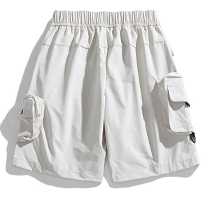 Detail of water-resistant cargo shorts featuring elastic drawstring waist and large pockets