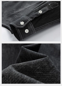 Macro detail of dark denim shirt sleeve with white buttons and contrast stitching