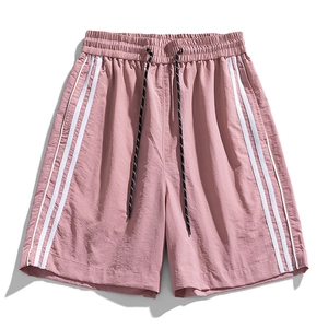 Pantaloncini sportivi rosa con strisce laterali bianche e coulisse regolabile in vita