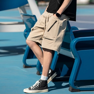 Men's khaki cargo shorts with zipper pockets and drawstring waist for summer wear