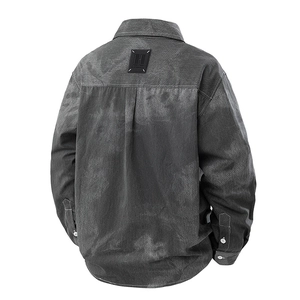 Back view of a long-sleeve washed denim shirt in dark grey with vintage style textures