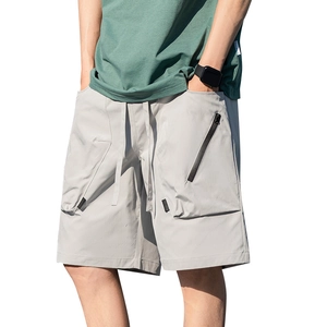 Men's loose cargo shorts in light grey featuring drawstrings and tactical utility pockets