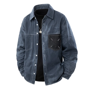 Men's long sleeve denim shirt in dark blue featuring a black contrast pocket and X-stitch